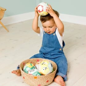 Child with Learning Ball - Farm