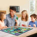 Family Playing Go Genius - General Knowledge